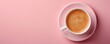 © Michael - Cup of coffee with crema on pastel pink background with copy space