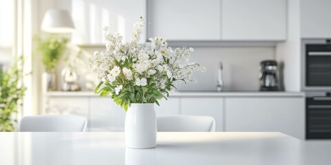 Canvas Print - White flowers in a vase on a table.