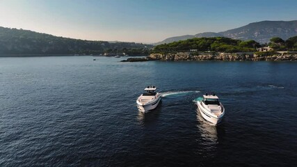 Wall Mural - two motor yacht in navigation at full speed