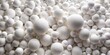 © Caitlin - A haphazard scattering of white styrofoam balls in different sizes creates a visually striking but disordered