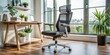 © Caitlin - Ergonomic office chair with adjustable height and lumbar support designed for long hours of computer use, providing