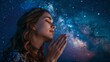 © Sirichat. Camphol - Image of a beautiful young woman praying with her eyes closed against a backdrop of a starry night sky. Worship.