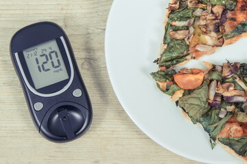 Wall Mural - Glucose meter with result of sugar level and fresh baked vegetarian pizza. Nutrition during diabetes