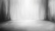 © Agent06 - A large empty room with a white wall and a grey floor