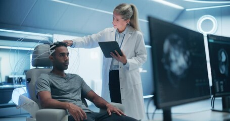 Aufkleber - Doctor Conducts an Advanced Brain Scan on a Male Patient in a Futuristic laboratory, Using High-tech Monitors and Sophisticated Neurological Devices for Analysis. Pan Shot from Monitor to Patient