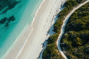 an aerial view of a sandy beach and ocean