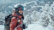 © COK House - Woman in red ski jacket, white helmet, and goggles smiles at camera against snowy mountain backdrop, evoking serene winter scene.