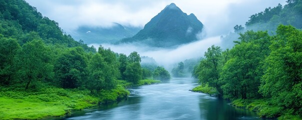 Wall Mural - A river in the middle of an overcast mountain range.