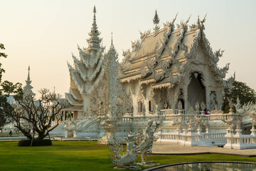 Chiang Rai, Thailand - March 2020: White temple or Wat Rong Khun with its resemblance in water