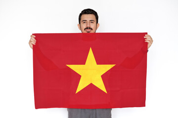 Young man holding Vietnam flag, independence day idea, two hands and white background, protest 