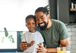 © Lumos sp - child family kitchen food boy son father breakfast happy together fun morning bonding healthy diet eating home black african american man happy kid game childhood cute parent preparing