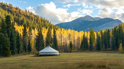 Canvas Print - A distant view of a yurt nestled among trees or mountains, emphasizing its location within nature.