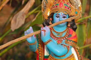 Indian figurine of the god Krishna.