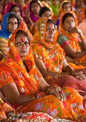 Wall Mural - Indian Women in Traditional Clothing Sitting Together