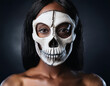 © Ranta Images - Woman in Skull and Bone Mask Day of the Dead Concept