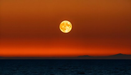 Wall Mural - A full moon rising over a dark ocean at sunset, with an orange and red sky in the background