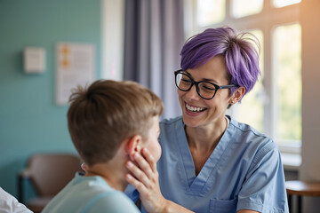 A kind and caring pediatric nurse or doctor  listens to and comforts a young boy patient