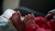 © Marco - Tiny baby feet, close-up view of infant toes, baby lying on patterned cushion, relaxed and cozy atmosphere, detailed and intimate shot of newborn feet, peaceful and tender moment