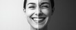 © EmPics - Half a face smiling and the other half frowning, split image, black and white, rightside copy space