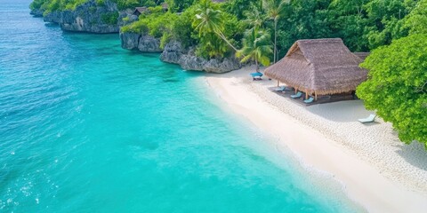 Wall Mural - A luxurious tropical beach resort with thatched huts and loungers on a perfect sandy beach with azure waves, hidden among lush vegetation.