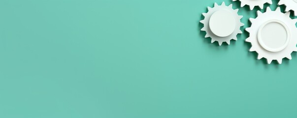 Three white gears on a Mint Green background, laid flat, copy space concept for business technology and development in the abstract vector with copy space 