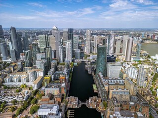 Aerial view of the Canary Wharf business district in London. Panoramia of the skyscrapers in London. Canary Wharf is part of London's central business district.