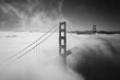 © Popelniushka - Gates Black And White. San Francisco Bridge Covered in Fog on a Calm Waterside
