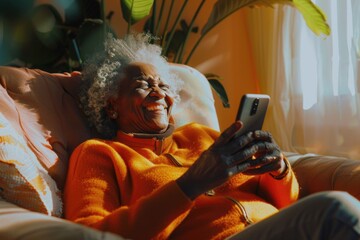 Canvas Print - A person is relaxing at home, using their mobile device