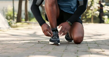 Canvas Print - Shoes, man and hands tying lace for fitness, safety and ready for run on nature path. Runner, feet and secure sneakers at start for training, wellness and sports preparation in park for challenge