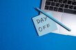 © Iuliia Pilipeichenko - Day off - workplace message in the office. Concept of absence from work and day off