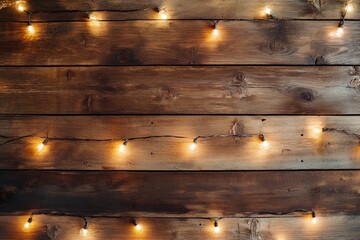 Wall Mural - Warm festive scene with string lights on rustic wooden wall creating cozy ambiance