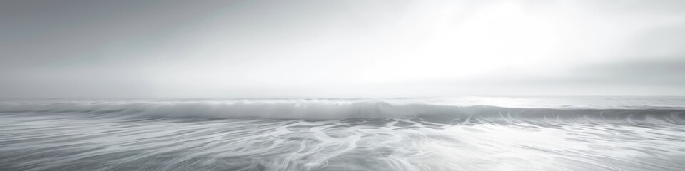 Poster - Minimalist monochromatic seascape featuring undulating waves and smooth water, taken during daylight with a long exposure.