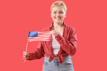 Poster - Young woman with USA flag on red background