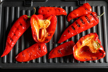 Wall Mural - Tasty grilled peppers on grill