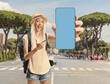 © Ljupco Smokovski - Female backpacker pointing at a smartphone on a street in Rome