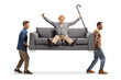 © Ljupco Smokovski - Movers carrying a sofa with a happy elderly man