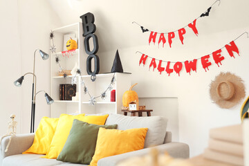 Poster - Interior of light living room decorated for Halloween with sofa and shelf unit