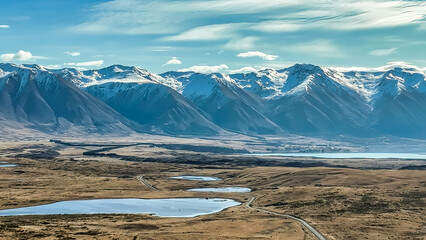 Wall Mural - The way to Lake Ohau and the southern alps through alpine grasses and tundra terrain