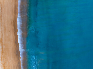 Beautiful beach and sand texture in sunny summer day background