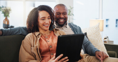 Sticker - Couple, smile and relax with tablet on sofa for online order, communication and discussion for lunch. Interracial, woman and man with technology at home for takeout app, decision and delivery of food