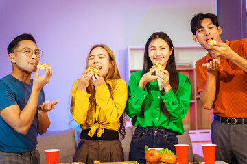 A group of Asian friends gathers in an office for a night of BBQ, pizza, and drinks, celebrating Halloween with vibrant RGB lighting, laughter, and cheering for their favorite soccer team.