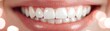 © Pungu x - Bright, healthy smile with white teeth, soft-focus bokeh background, perfect dental care and beauty concept