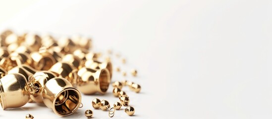 Poster - Close up of Christmas golden jingle bells decoration on a white background. Copy space image. Place for adding text and design