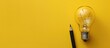 © Ilgun - Creative concepts and inspiration for business featuring a lightbulb and pencil on a yellow background Motivation for success Think big ideas. Copy space image. Place for adding text and design