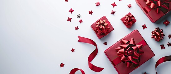 Poster - Festive gift boxes featuring red ribbon bows isolated against a white background. Copy space image. Place for adding text and design