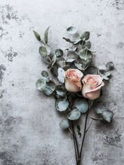 Poster - A stylish bouquet featuring soft pink roses intertwined with fresh eucalyptus leaves on a textured concrete background. Generative AI