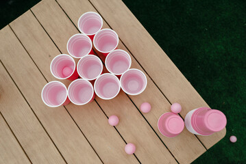 Sticker - Beer pong setup with pink cups and balls