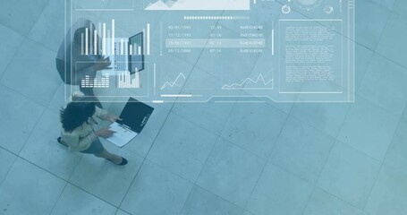 Poster - Business professionals working on laptops and documents, data analysis animation over them