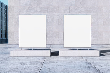 Poster - Empty white posters in front of building exterior. Sunny day. Commercial concept. Mock up, 3D Rendering.