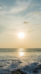 Wall Mural - timelapse of dramatic sunset with orange sky in a cloudy day at a beach.